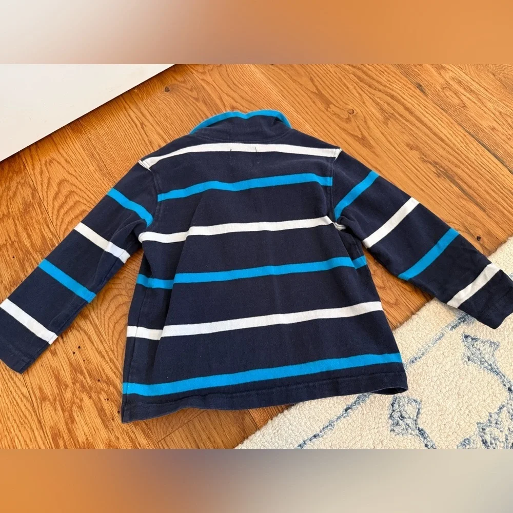 The Children's Place quarter-zip pullover in navy, white, and light blue stripes